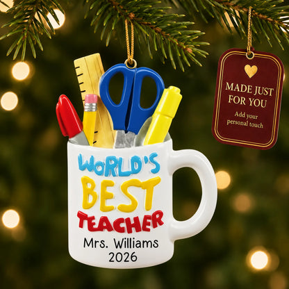 Personalized World's Best Teacher mug Christmas ornament hanging among tree lights with a Made Just For You tag