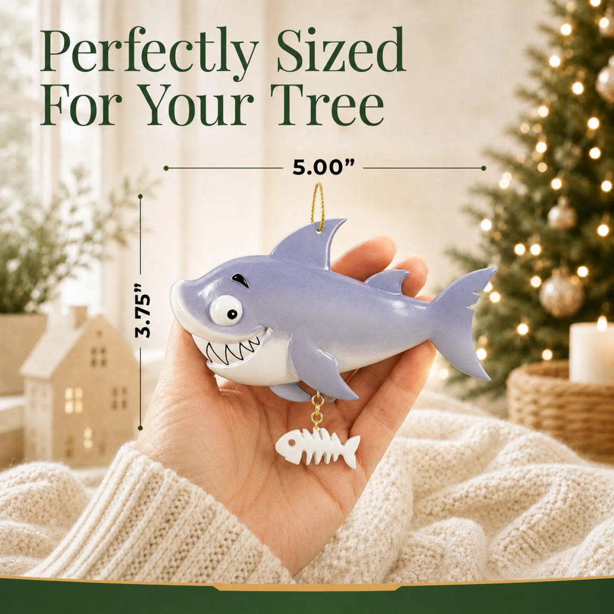 Size guide: the personalized shark christmas ornament is 5.00 in wide by 3.75 in tall, shown in hand