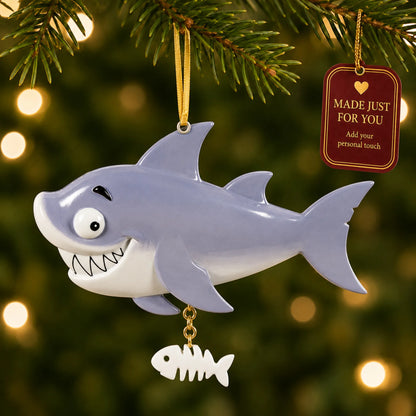 Shark christmas ornament hanging on a lit Christmas tree with a Made Just For You gift tag