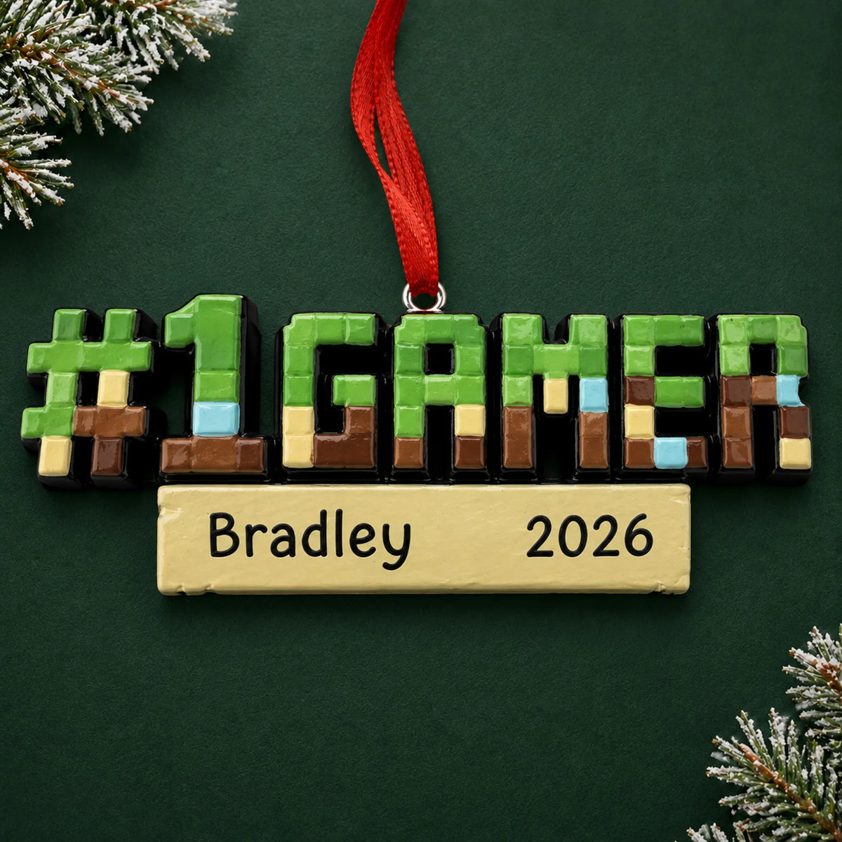 Personalized pixel block gamer christmas ornament on a dark green pine background