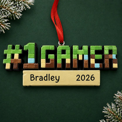 Personalized pixel block gamer christmas ornament on a dark green pine background