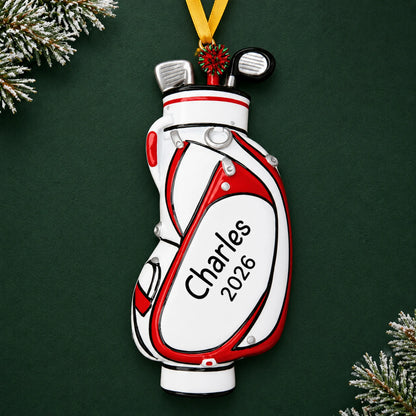 Personalized white golf bag christmas ornament on a dark green pine background