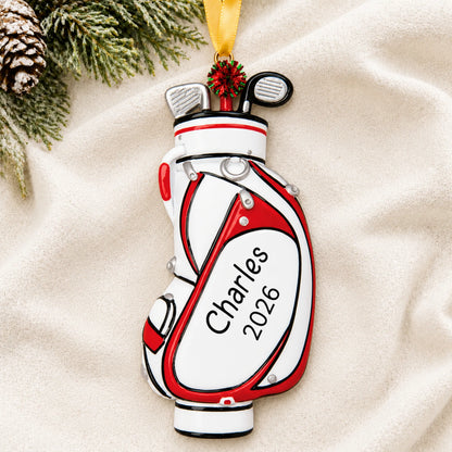 Personalized white golf bag christmas ornament laid on a soft white knit blanket