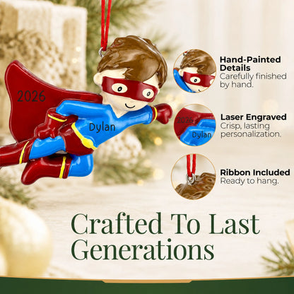 Hand-painted details and laser engraved personalization on the super hero christmas ornament, ribbon included