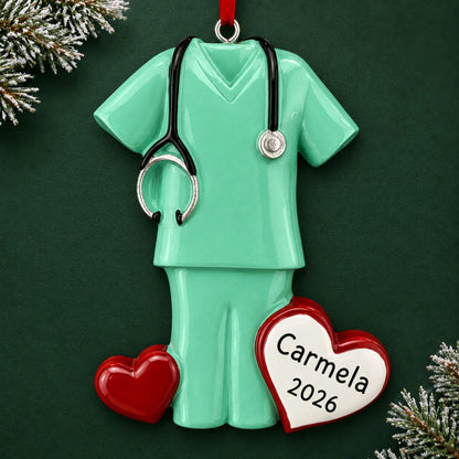 Personalized green scrubs christmas ornament on a dark green pine background