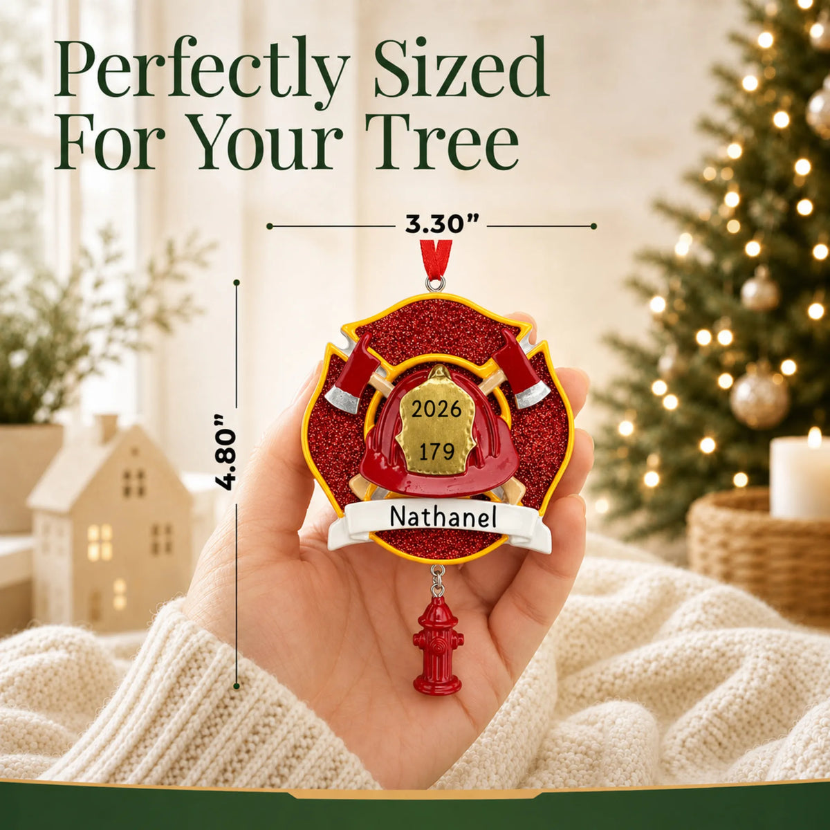 Size guide: the personalized firefighter emblem christmas ornament is 3.30 in wide by 4.80 in tall, shown in hand