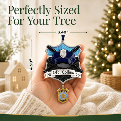 Size guide: the personalized police officer christmas ornament shown in hand next to a Christmas tree