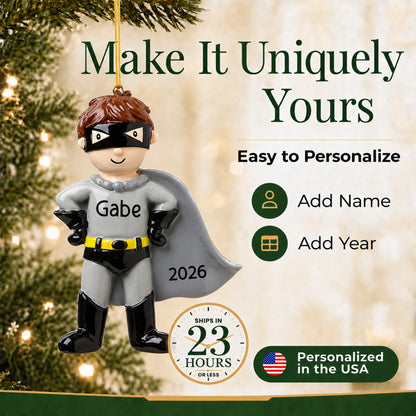 Make it yours: add name and year to the personalized caped super hero christmas ornament