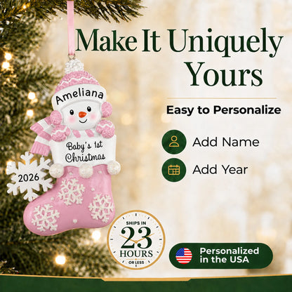 Make it yours: add name and year to the personalized pink snowman baby's 1st christmas ornament