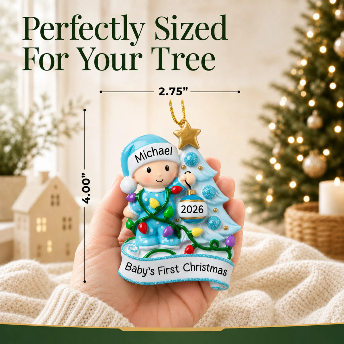 Size guide: the personalized blue baby's 1st christmas tree ornament is 2.75 in wide by 4.00 in tall, shown in hand