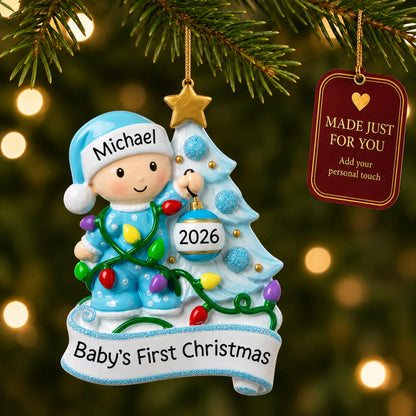 Blue baby's 1st christmas tree ornament hanging on a lit Christmas tree with a Made Just For You gift tag