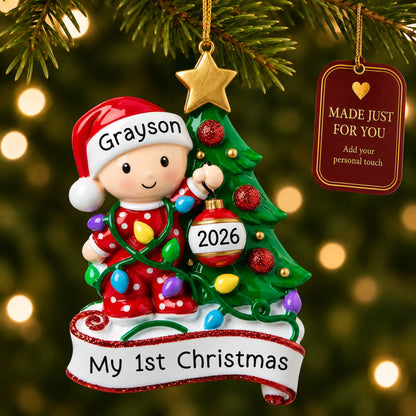 Red baby's 1st christmas tree ornament hanging on a lit Christmas tree with a Made Just For You gift tag