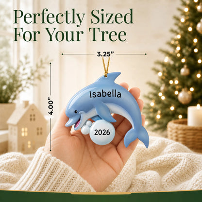 Size guide: the personalized dolphin fun christmas ornament is 3.25 in wide by 4.00 in tall, shown in hand