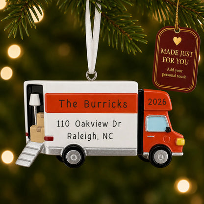 Moving Truck christmas ornament hanging on a lit Christmas tree with a Made Just For You gift tag