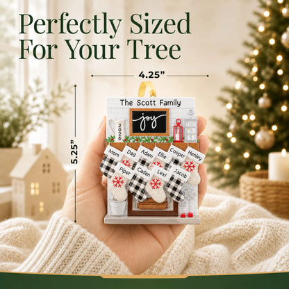 Size guide: the personalized fireplace stockings family of 10 christmas ornament shown in hand next to a Christmas tree
