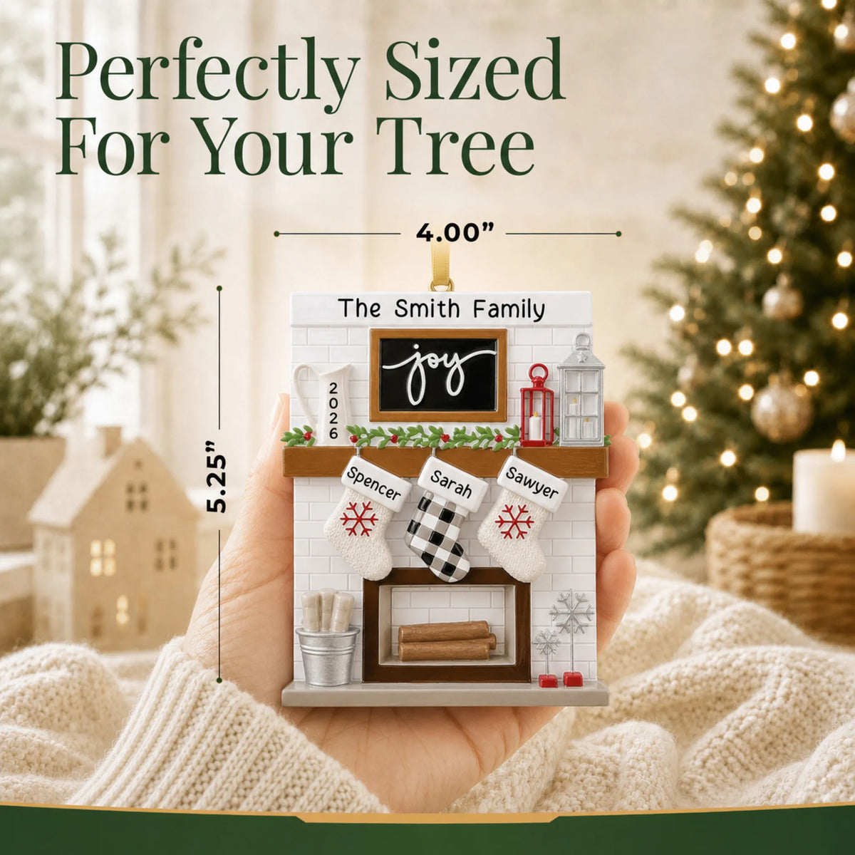 Size guide: the personalized fireplace stockings family of 3 christmas ornament shown in hand next to a Christmas tree