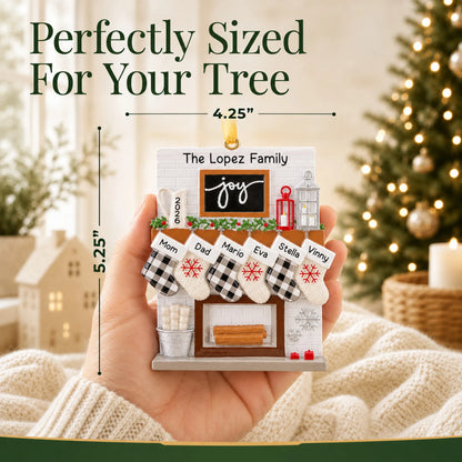 Size guide: the personalized fireplace stockings family of 6 christmas ornament shown in hand next to a Christmas tree
