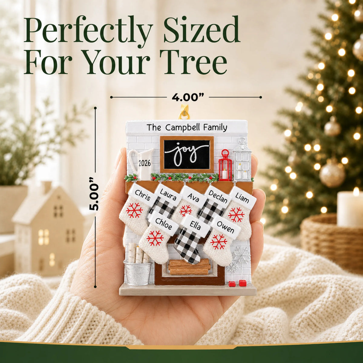 Size guide: the personalized fireplace stockings family of 8 christmas ornament shown in hand next to a Christmas tree