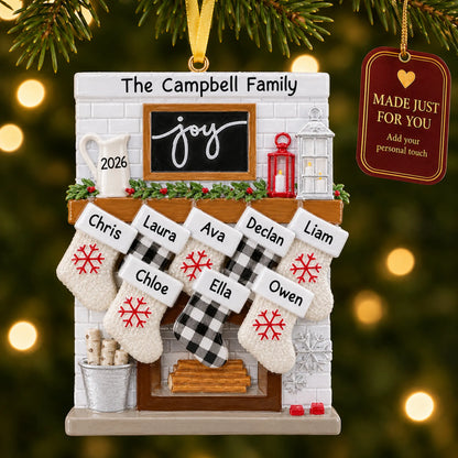 Fireplace stockings family of 8 christmas ornament hanging on a lit Christmas tree with a Made Just For You gift tag