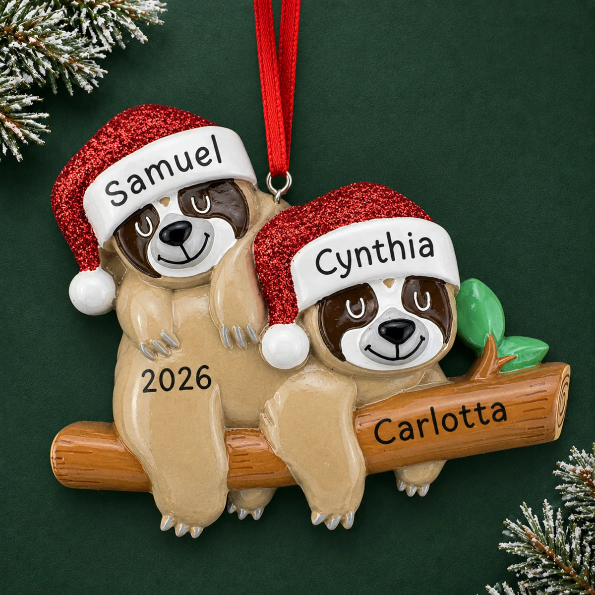 Personalized sloth couple christmas ornament on a dark green pine background