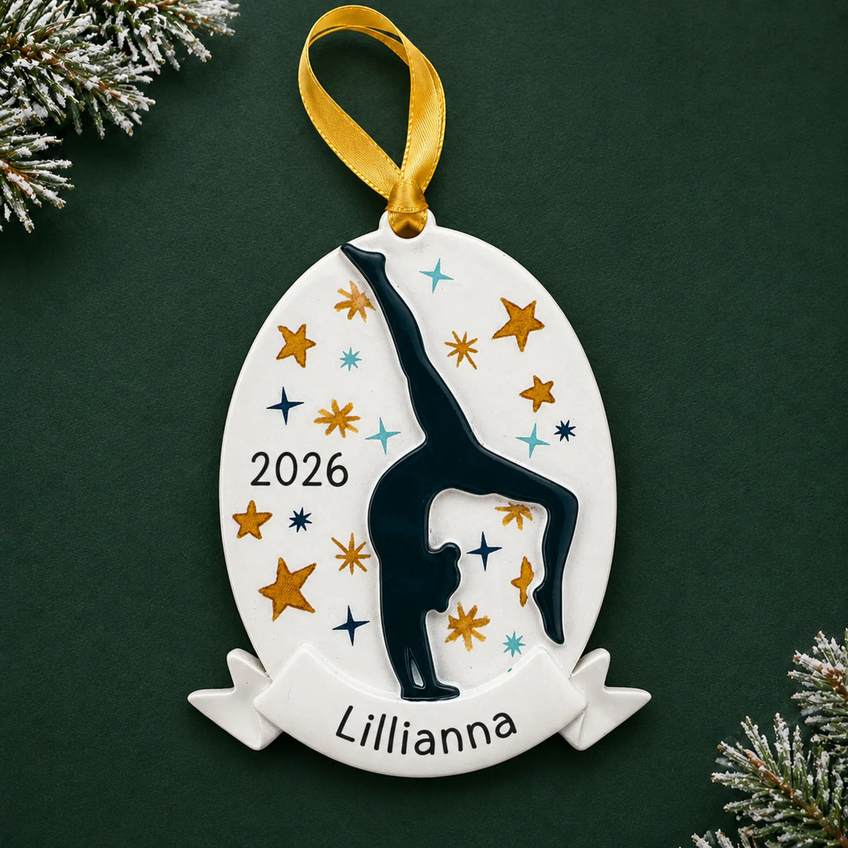 Personalized gymnastics superstar christmas ornament on a dark green pine background