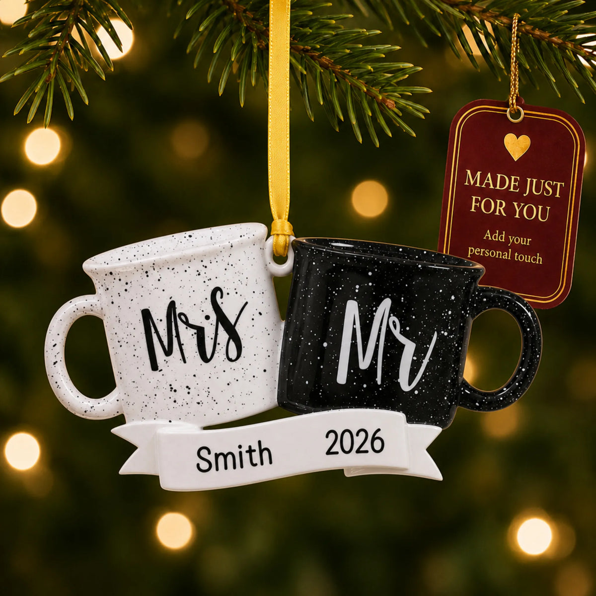 Personalized Mr & Mrs couple mug Christmas ornament on a lit Christmas tree with a Made Just For You tag