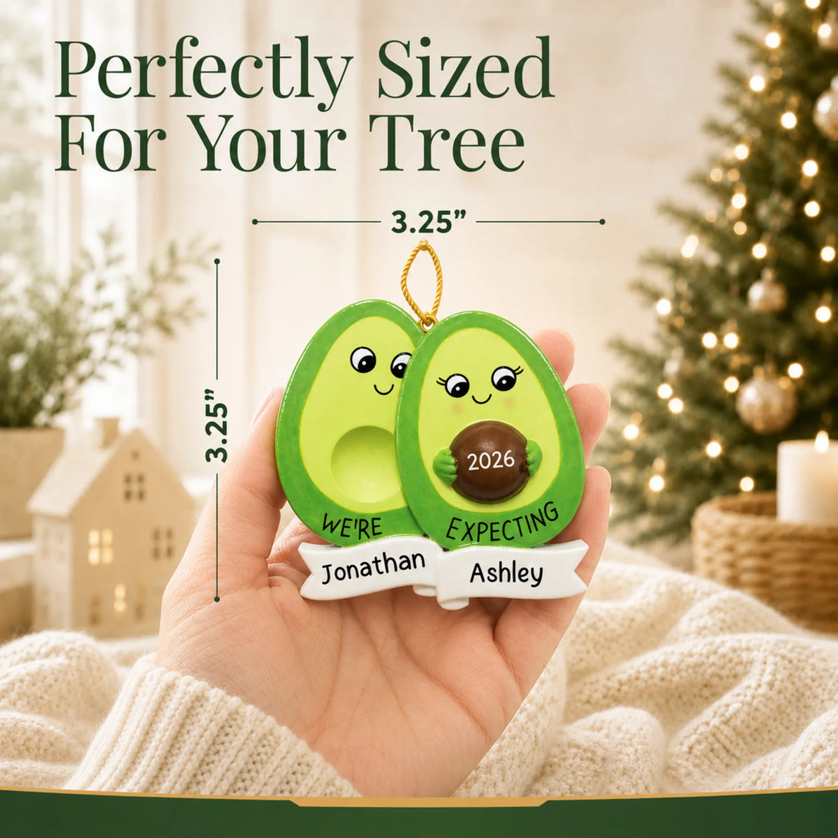 Size guide: the personalized Avocado Expecting Couple christmas ornament is 3.25 in wide by 3.25 in tall, shown in hand