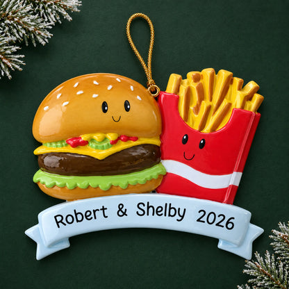 Personalized Burger & Fries Couple christmas ornament on a dark green pine background