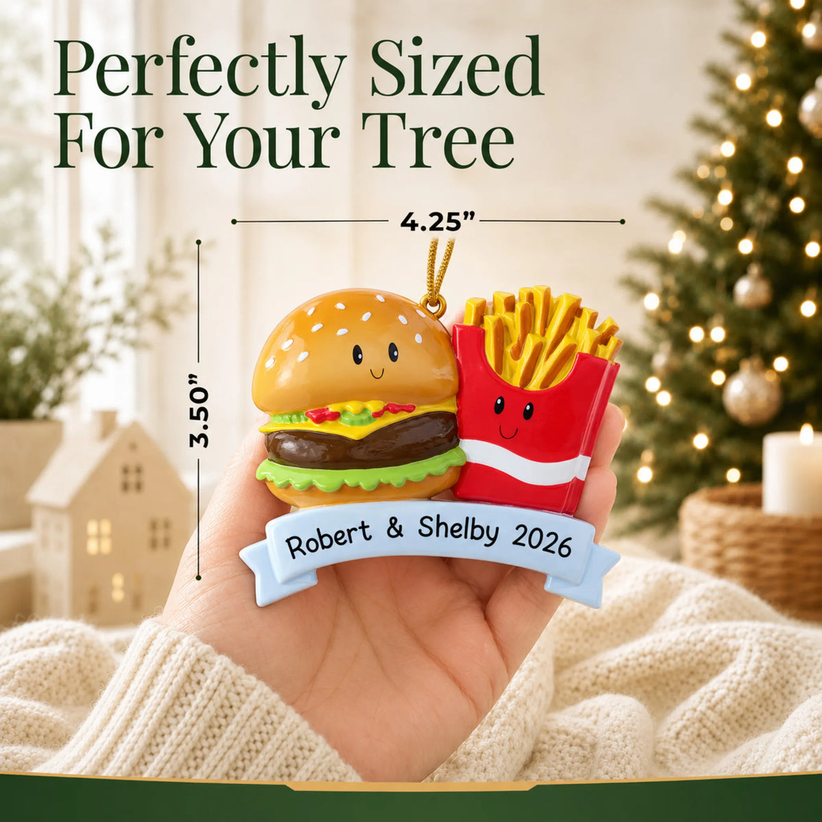 Size guide: the personalized Burger & Fries Couple christmas ornament is 4.25 in wide by 3.50 in tall, shown in hand