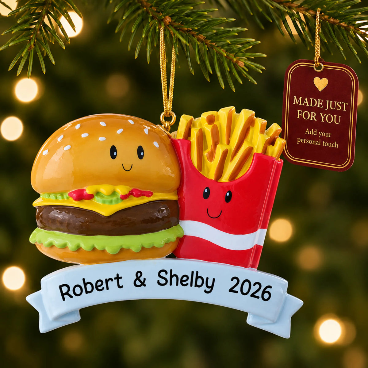 Burger & Fries Couple christmas ornament hanging on a lit Christmas tree with a Made Just For You gift tag