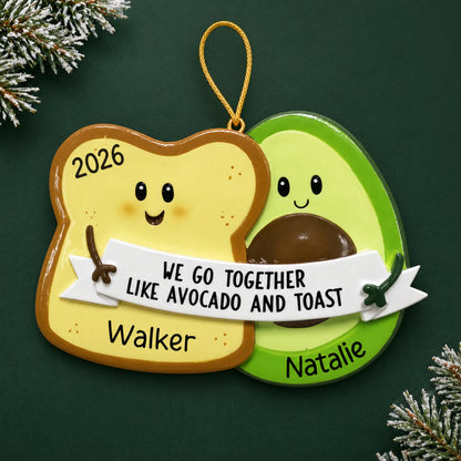 Personalized Avocado & Toast christmas ornament on a dark green pine background