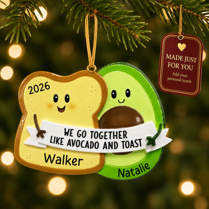 Avocado & Toast christmas ornament hanging on a lit Christmas tree with a Made Just For You gift tag
