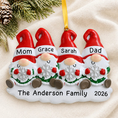 Personalized gnome family of 4 christmas ornament laid on a soft white knit blanket