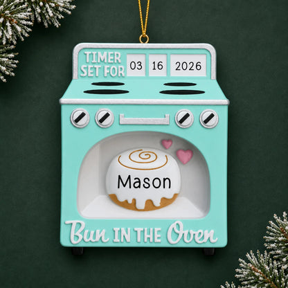 Personalized Bun In The Oven christmas ornament on a dark green pine background