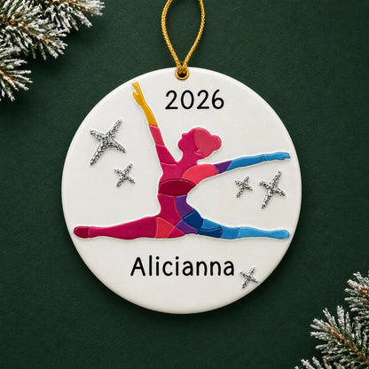 Personalized dance pose christmas ornament on a dark green pine background