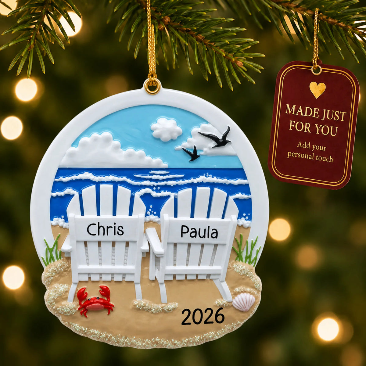 Beach adirondack chair couple christmas ornament hanging on a lit Christmas tree with a Made Just For You gift tag