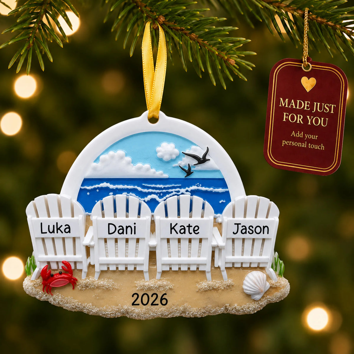 Beach chair family of 4 christmas ornament hanging on a lit Christmas tree with a Made Just For You gift tag