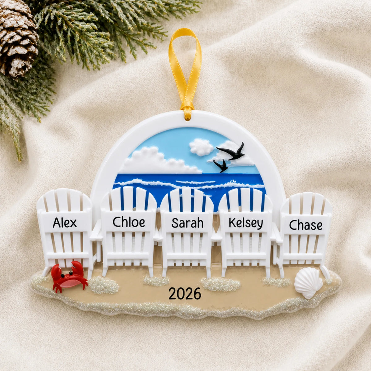 Personalized beach chair family of 5 christmas ornament laid on a soft white knit blanket
