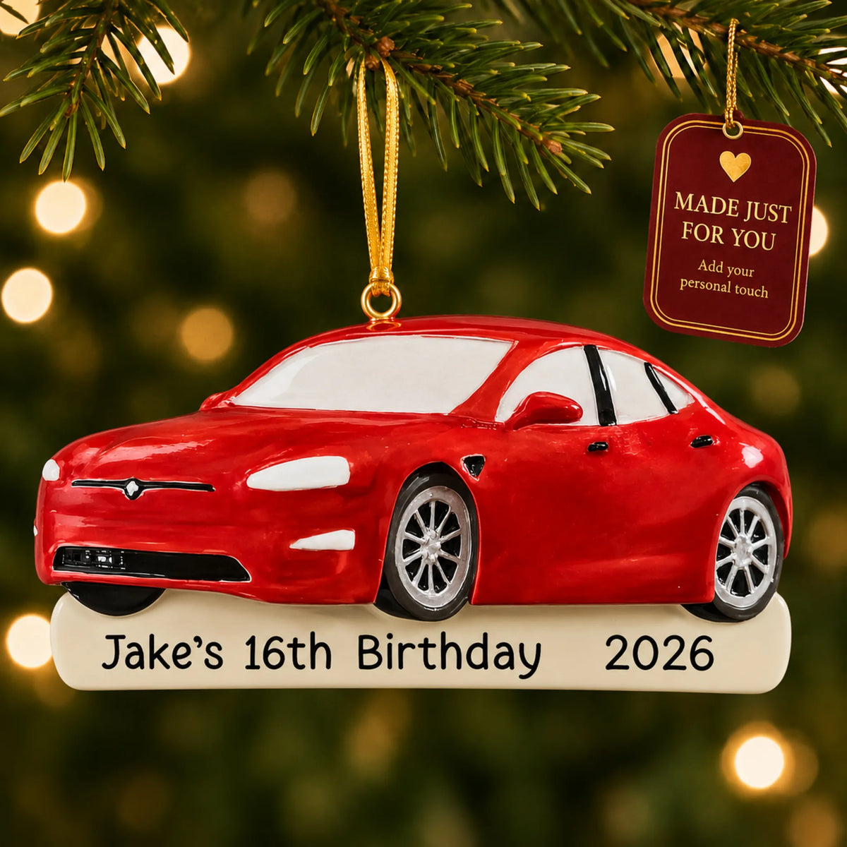 Red Sports Car christmas ornament hanging on a lit Christmas tree with a Made Just For You gift tag