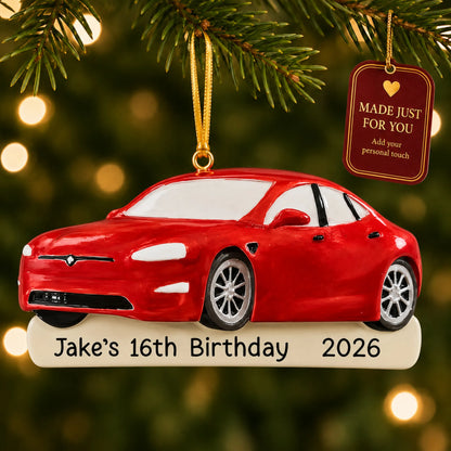 Red Sports Car christmas ornament hanging on a lit Christmas tree with a Made Just For You gift tag