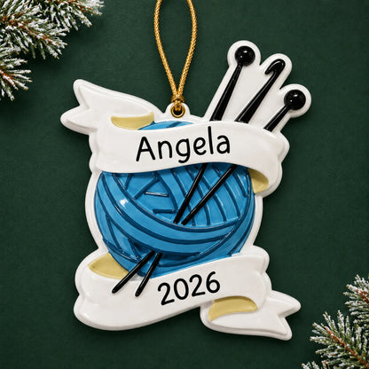 Personalized knitting yarn and needles christmas ornament on a dark green pine background