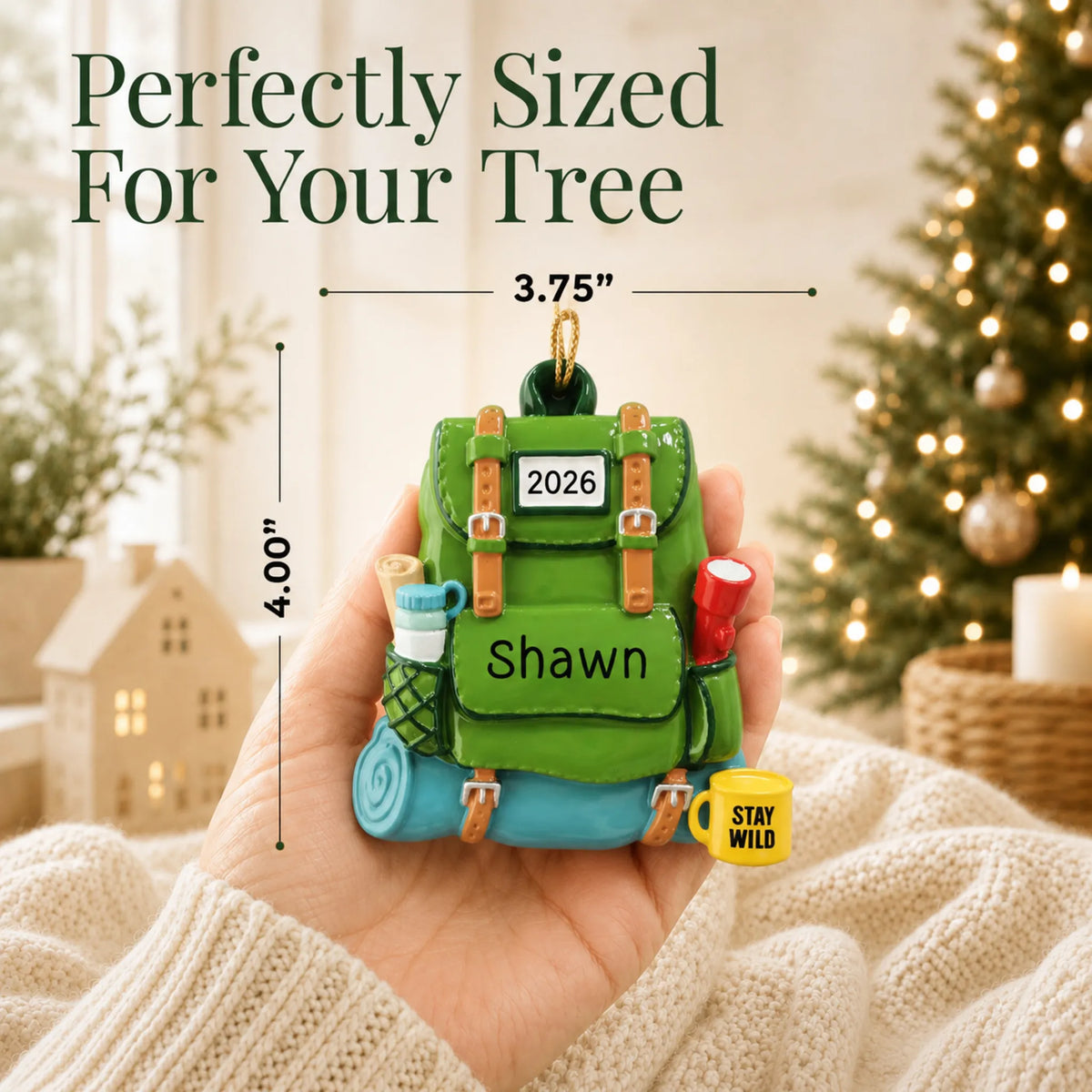 Size guide: the personalized hiking backpack christmas ornament is 3.75 in wide by 4.00 in tall, shown in hand