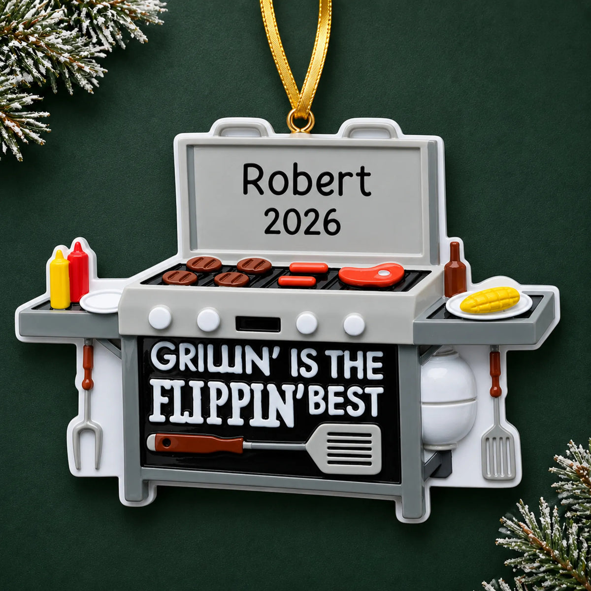 Personalized BBQ Grilling christmas ornament on a dark green pine background