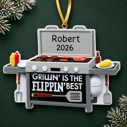 Personalized BBQ Grilling christmas ornament on a dark green pine background