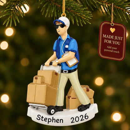 Amazon delivery guy christmas ornament hanging on a lit Christmas tree with a Made Just For You gift tag