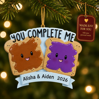 Peanut Butter & Jelly Couple christmas ornament hanging on a lit Christmas tree with a Made Just For You gift tag