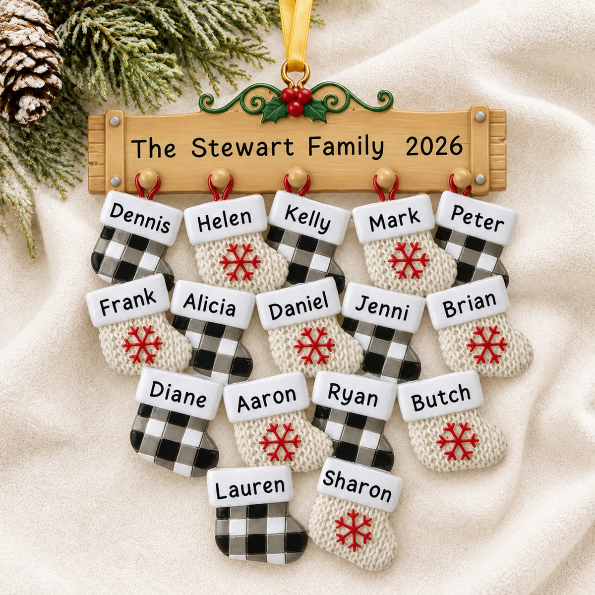 Personalized large family of 16 christmas ornament laid on a soft white knit blanket