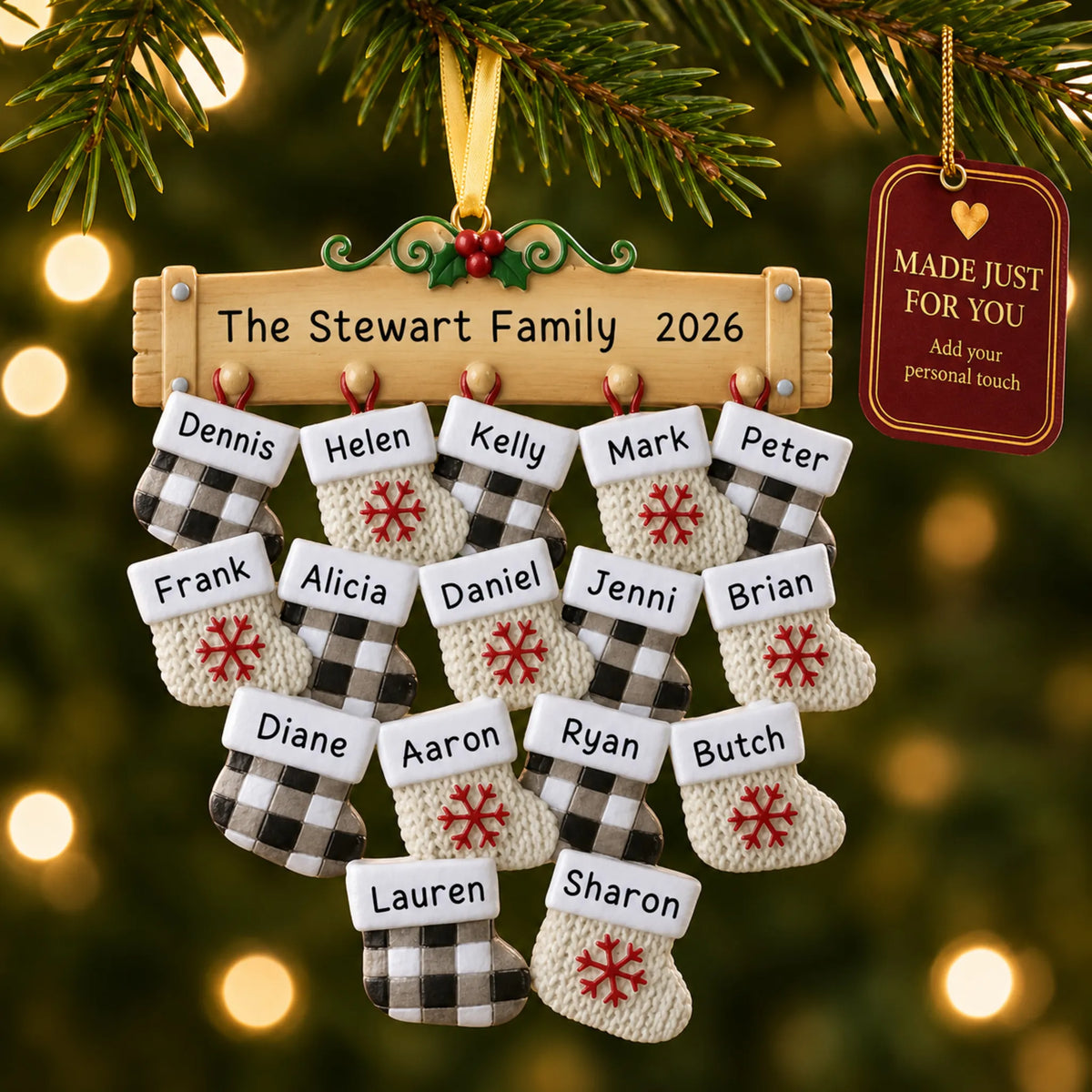 Large family of 16 christmas ornament hanging on a lit Christmas tree with a Made Just For You gift tag
