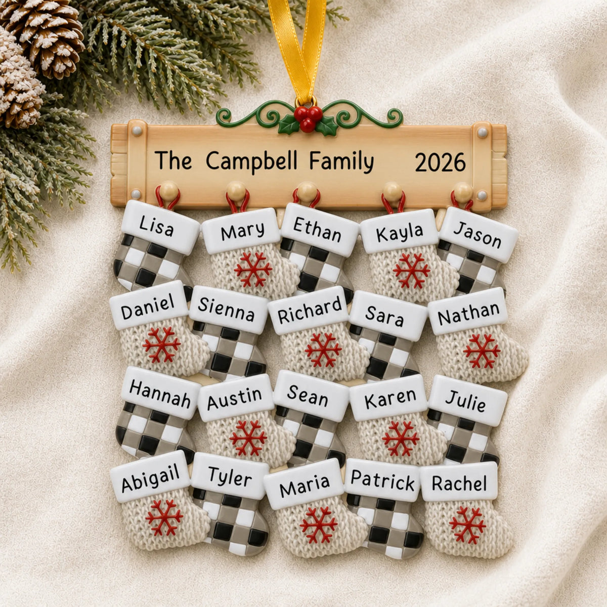 Personalized large family of 20 christmas ornament laid on a soft white knit blanket