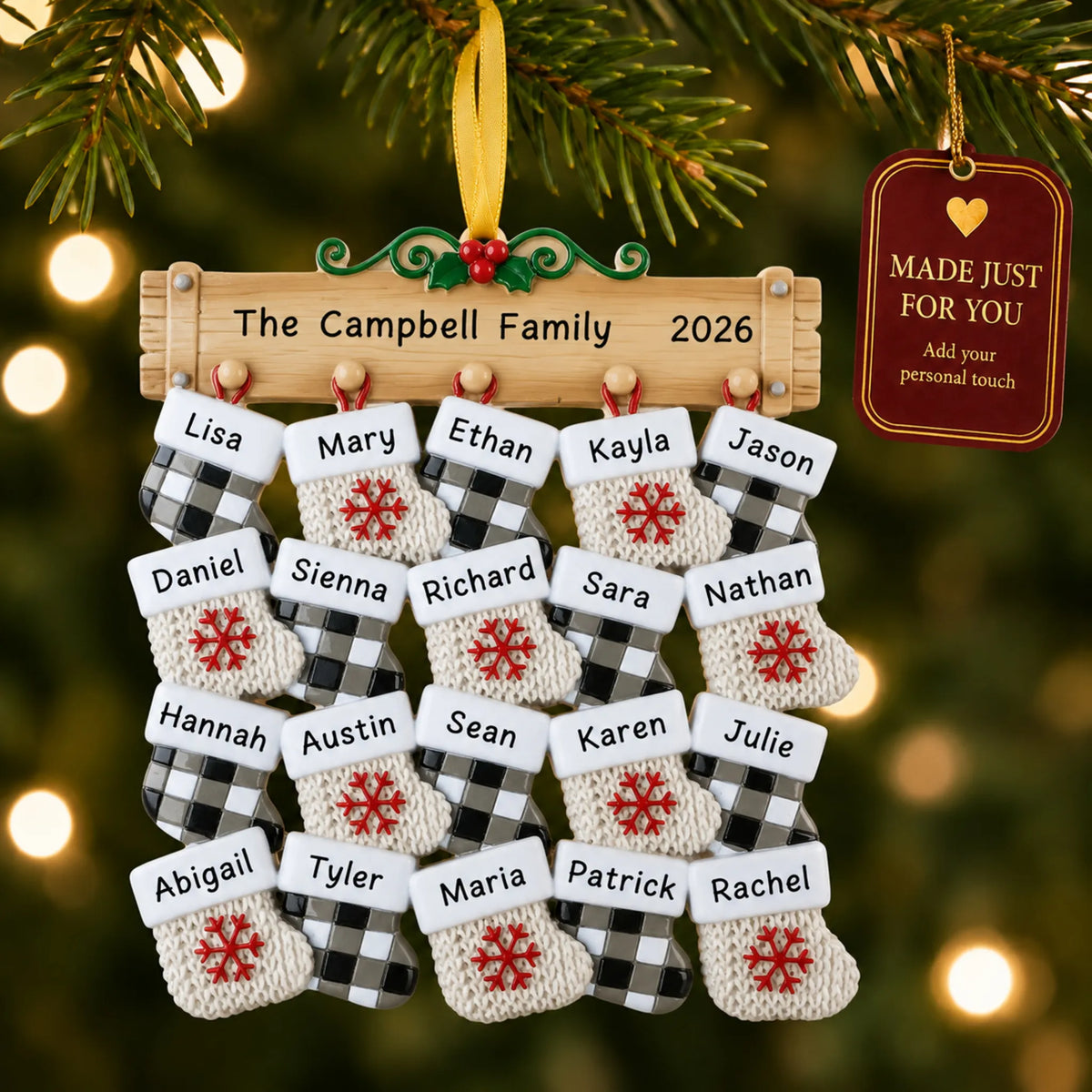 Large family of 20 christmas ornament hanging on a lit Christmas tree with a Made Just For You gift tag